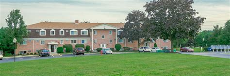 KNOLLCREST VILLAGE .